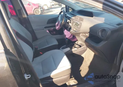 2014 Toyota Prius C One from USA, damaged, VIN JTDKDTB32E1557743